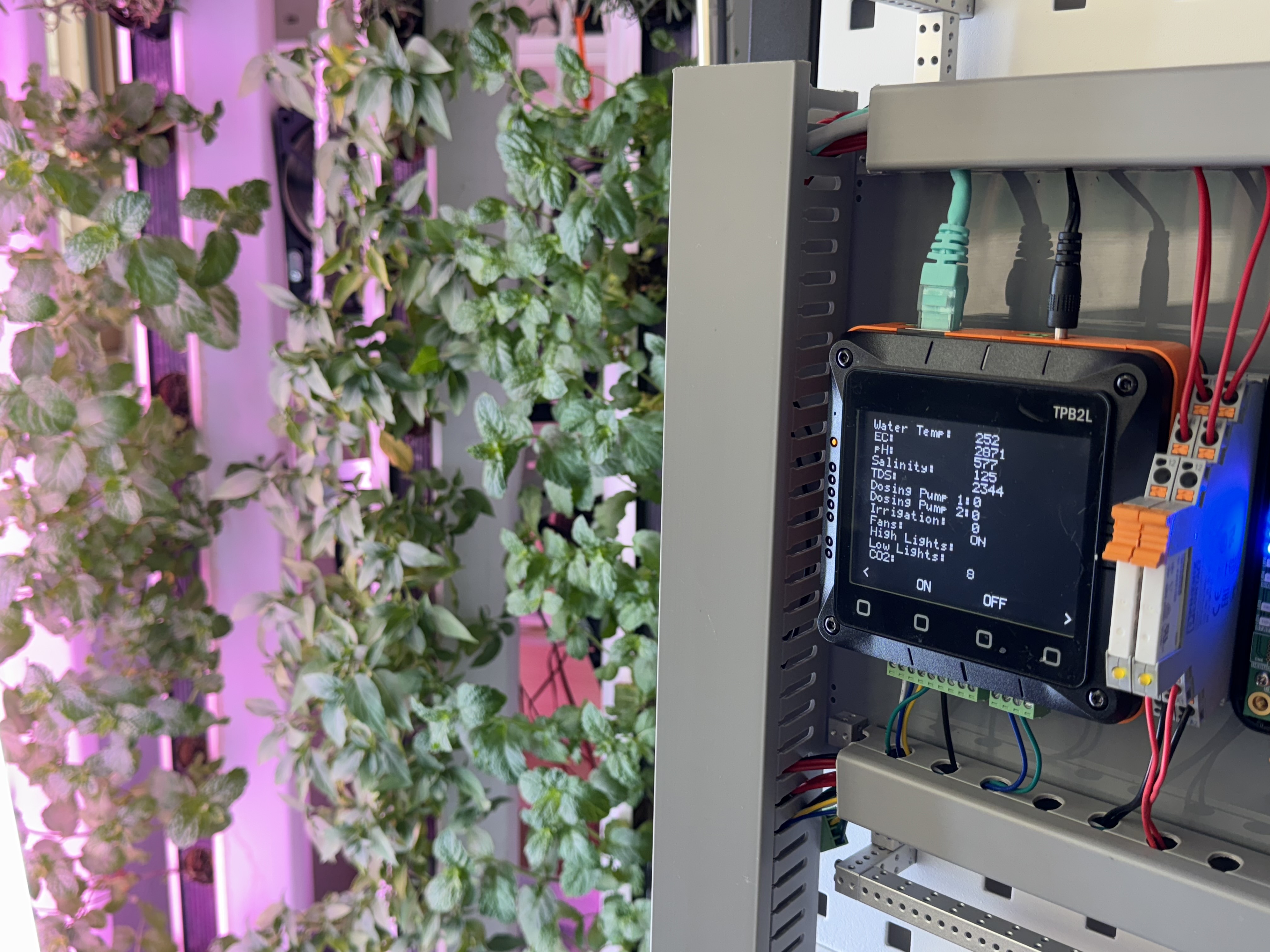 A controller with a touchpanel in an electrical panel with various values for plant-life monitoring.
